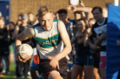 Man Running with Ball in Game