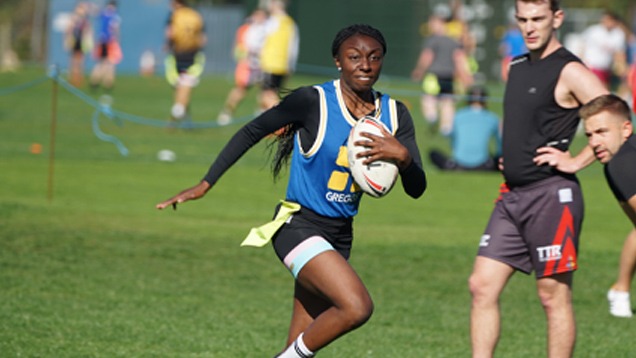 Woman Running in Greggs Kit